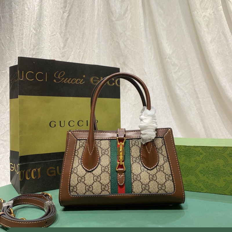 G*u*i top handle bags